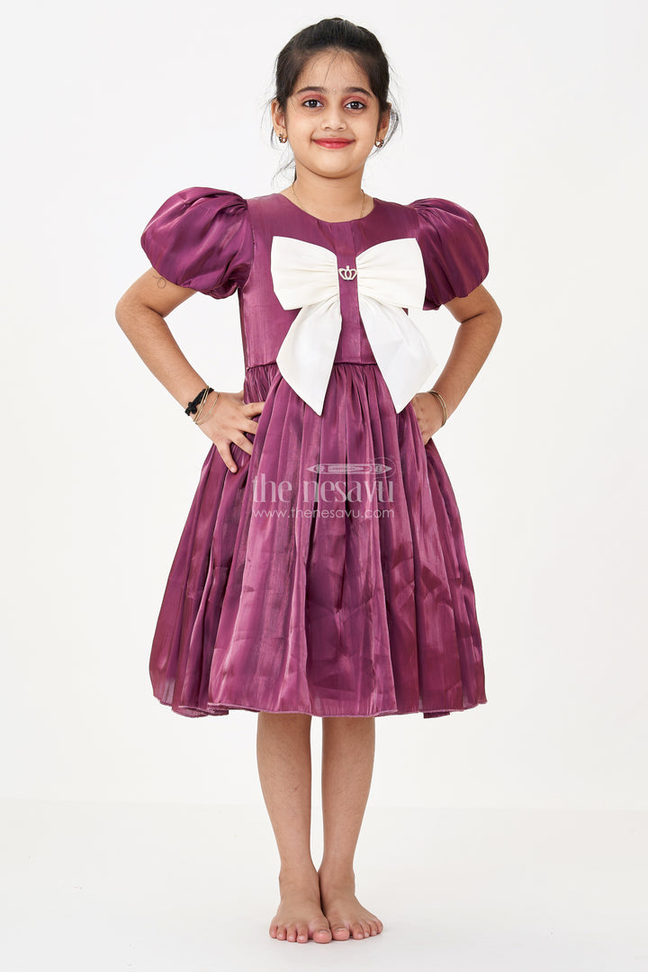 Girls Black Frock Dress in Glossy Satin with Ivory Bow and Crown Brooch for Party Elegance
