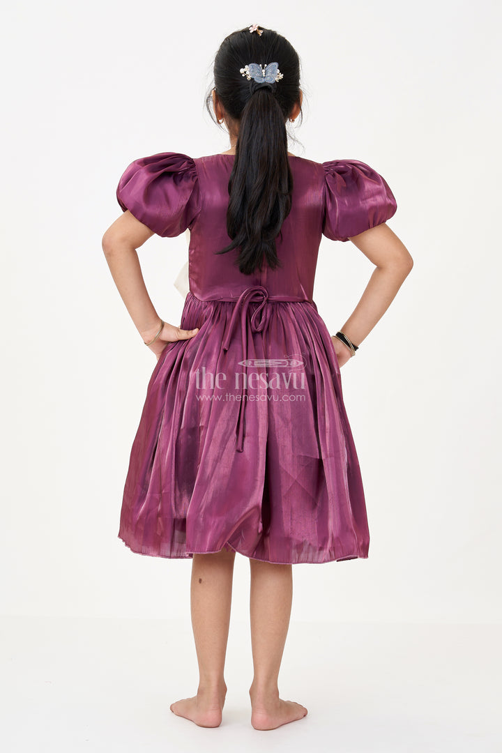 Girls Black Frock Dress in Glossy Satin with Ivory Bow and Crown Brooch for Party Elegance