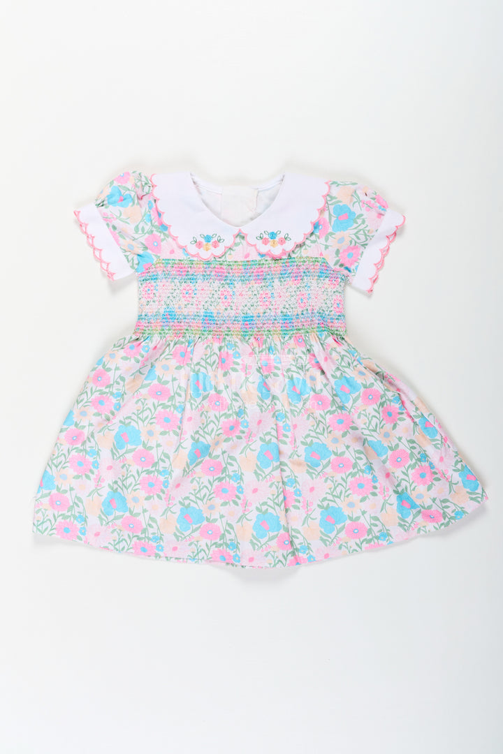 Girls Pink Flower Print Dress in Cotton with Embroidered Collar and Smocking for a Sweet Vintage Look