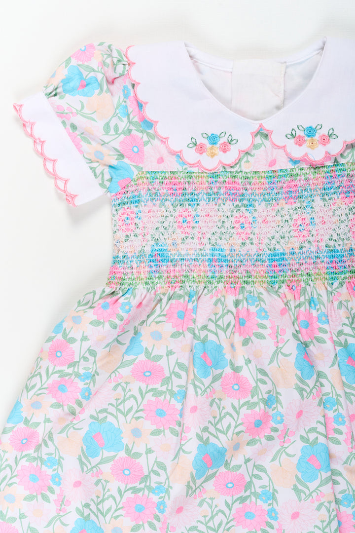 Girls Pink Flower Print Dress in Cotton with Embroidered Collar and Smocking for a Sweet Vintage Look