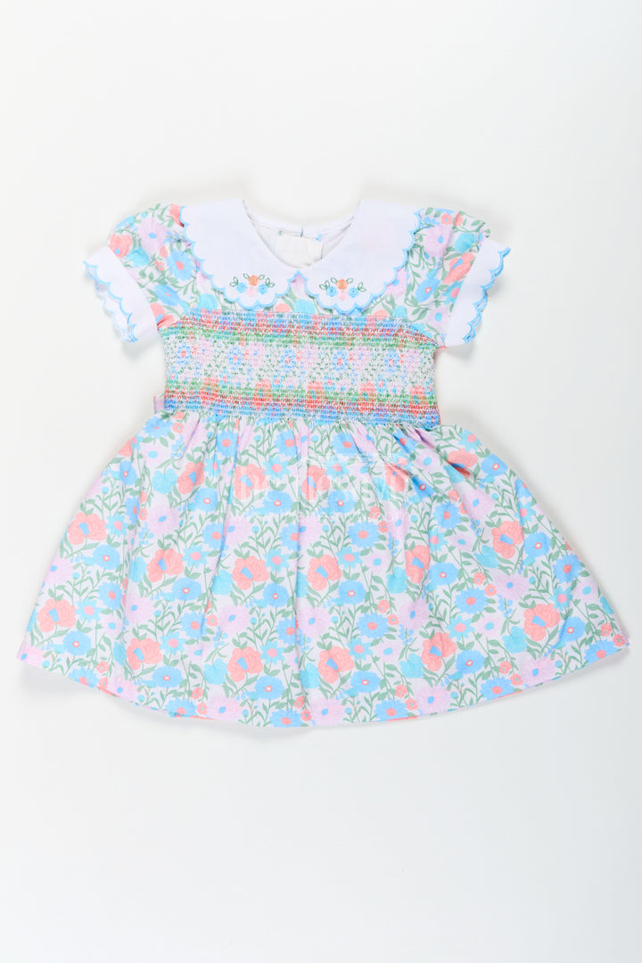 Girls Collar Frock Design in Floral Cotton with Smocked Bodice and Embroidered Collar for a Playful Yet Polished Look