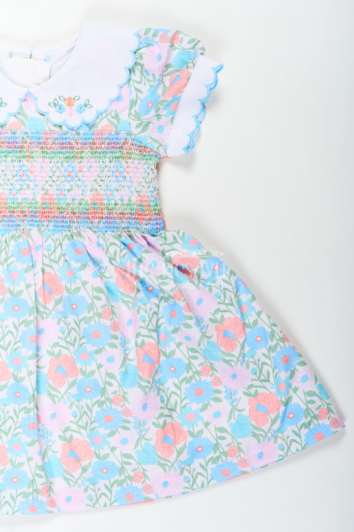 Girls Collar Frock Design in Floral Cotton with Smocked Bodice and Embroidered Collar for a Playful Yet Polished Look