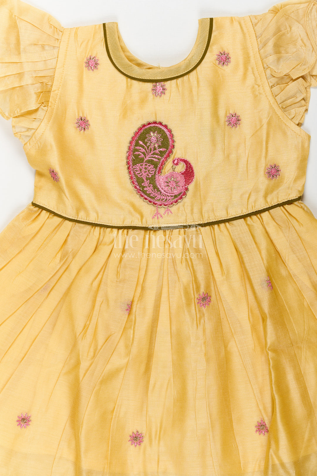 Girls Yellow Chanderi Simple Frocks Designs with Paisley Embroidery and Soft Ruffles