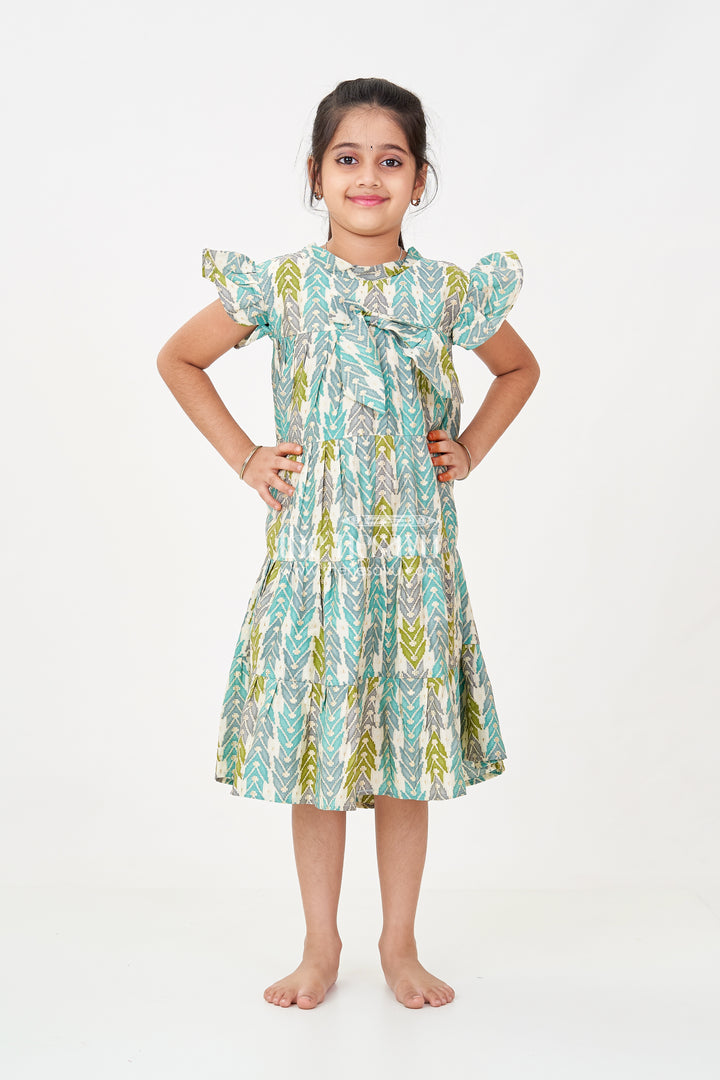 Green Colour Frock for Girls in Modal Silk with Multicolor Geometric Print and Front Bow Design