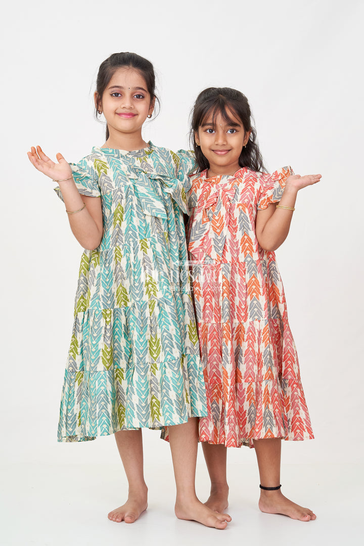 Green Colour Frock for Girls in Modal Silk with Multicolor Geometric Print and Front Bow Design