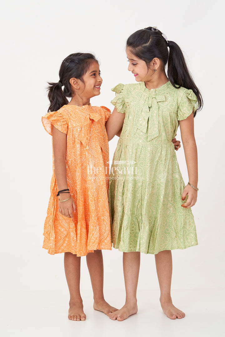 Nesavu Casual Cotton Frocks for Girls in Rayon with Orange Bandhani Print and Gold Foil Details