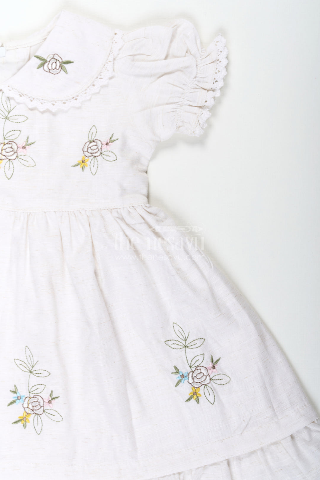 White Cotton Frocks for Girls with Floral Embroidery Puff Sleeves and Peter Pan Collar