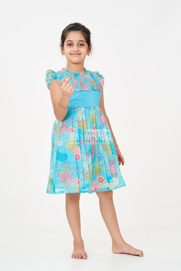 Girls frock eid stylish dress design in Vibrant Floral Cotton with Sequin Accents and Pleated Skirt