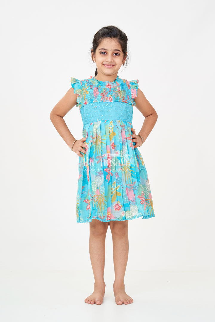 Girls frock eid stylish dress design in Vibrant Floral Cotton with Sequin Accents and Pleated Skirt
