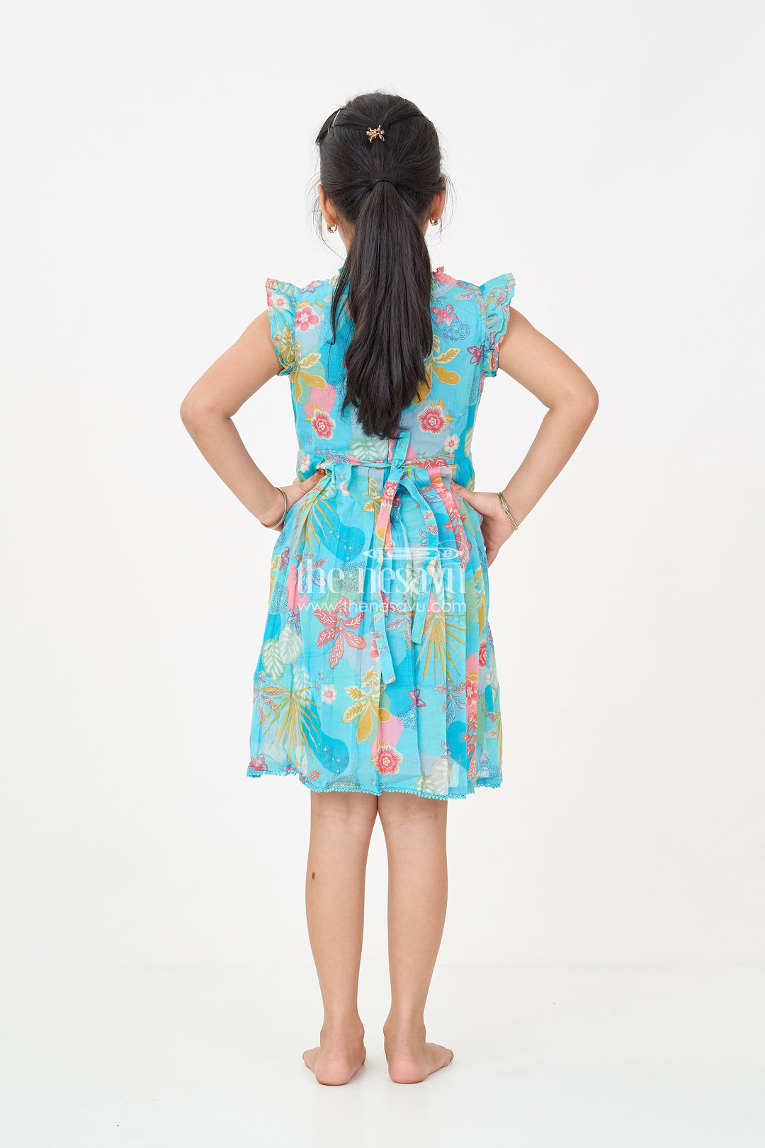 Girls frock eid stylish dress design in Vibrant Floral Cotton with Sequin Accents and Pleated Skirt