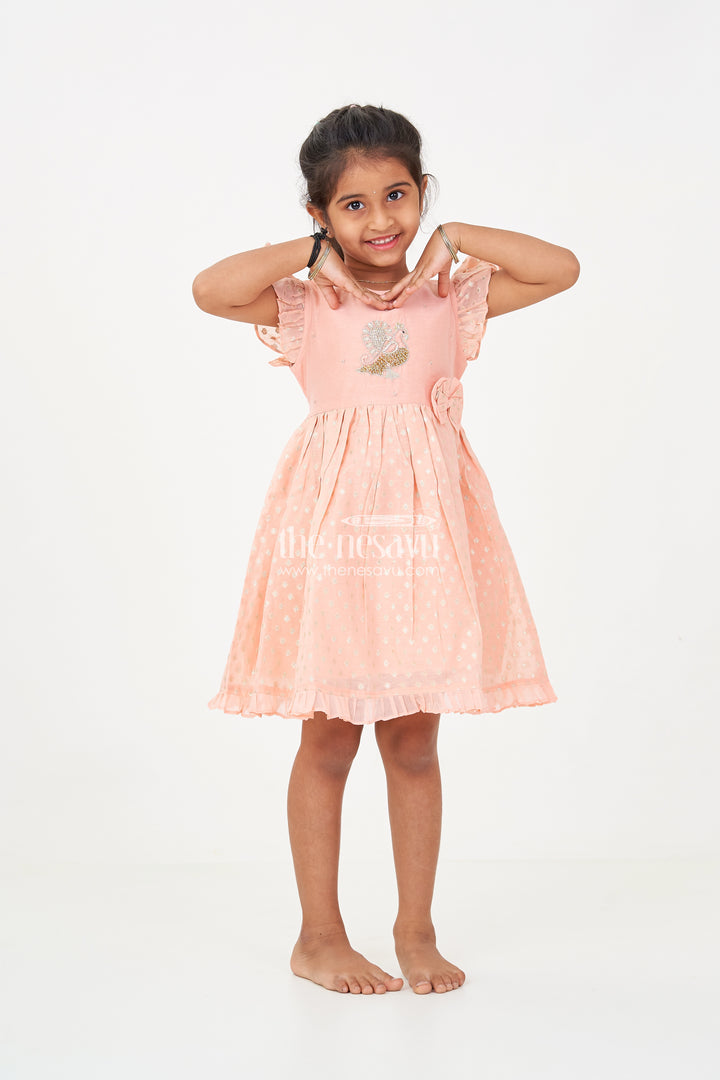 Girls dark peach colour frock in Chanderi with Thread Embroidered Peacock and Frilled Hem Design
