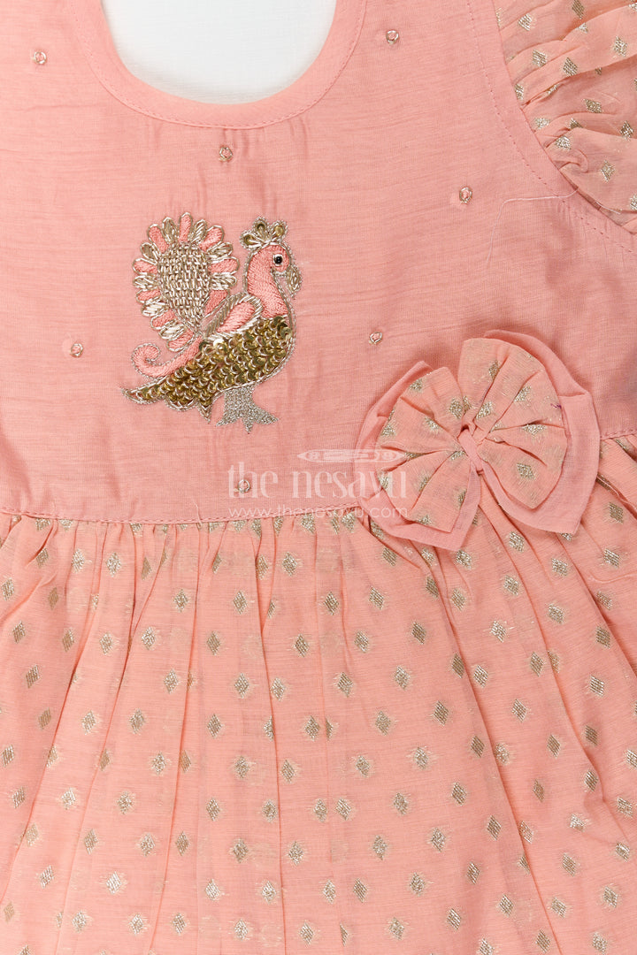 Girls dark peach colour frock in Chanderi with Thread Embroidered Peacock and Frilled Hem Design