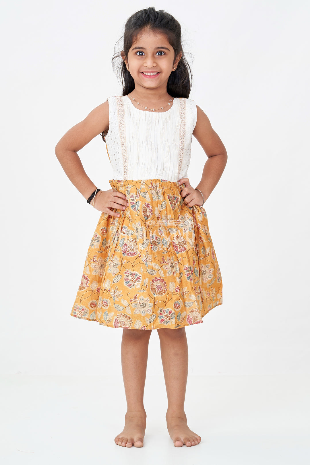 Girls Modal Silk Frock with Eyelet Yoke and Floral Skirt in printed frock design Style
