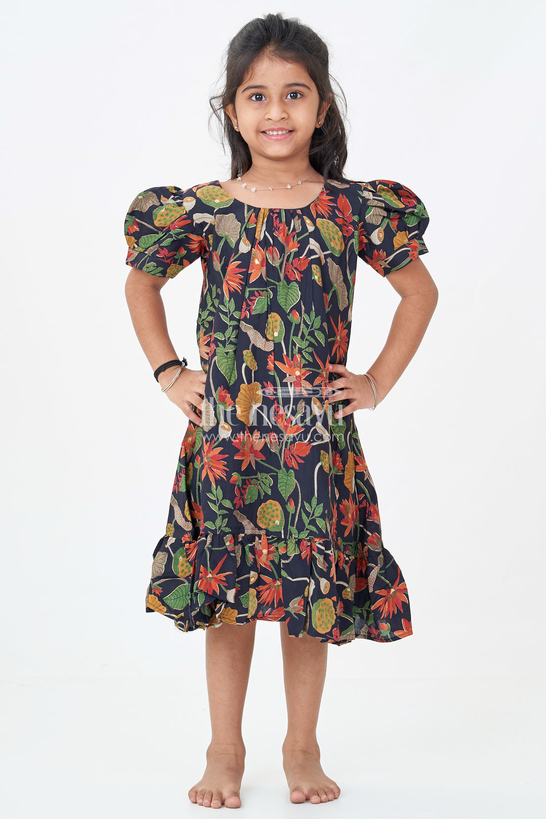 Girls Cute Party Frocks in Black Modal Silk with Nature Inspired Digital Print and Ruffled Bottom