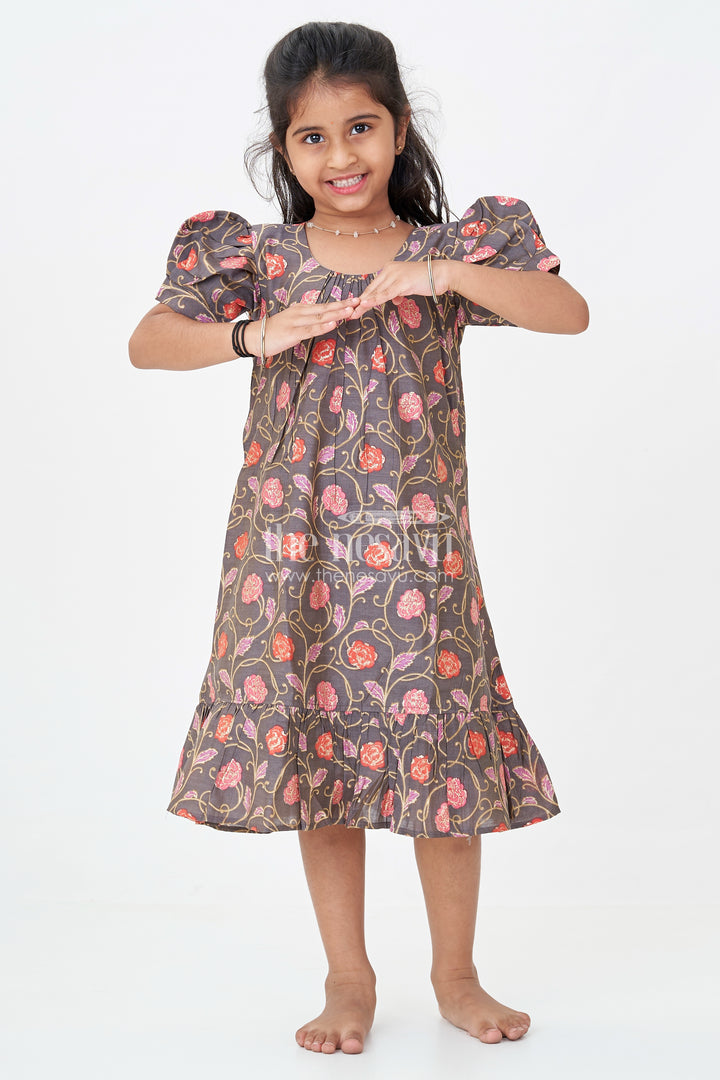 Girls Small Frock Design in Brown Muslin Silk with Red Floral Print and Flared Ruffle Hem