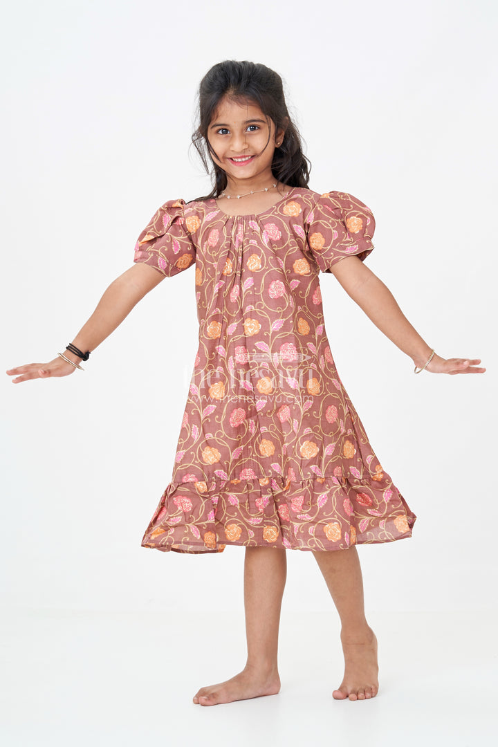 Girls Sleeves Design Frock in Brown Muslin Silk with Floral Print and Gathered Hem for Everyday Charm