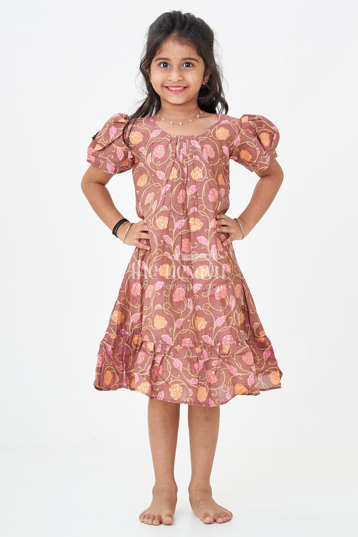 Girls Sleeves Design Frock in Brown Muslin Silk with Floral Print and Gathered Hem for Everyday Charm