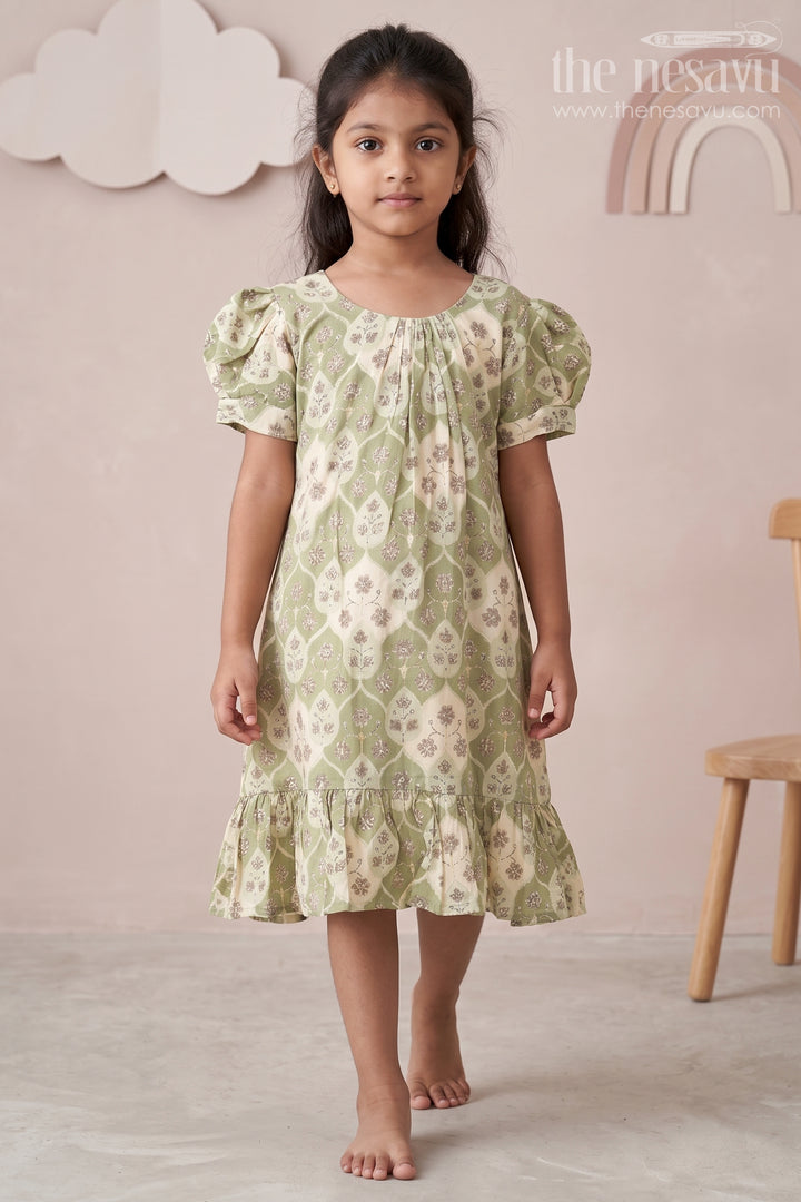 Girls Trending Frock Design in Green Muslin Silk with Floral Leaf Digital Print and Short Puff Sleeves