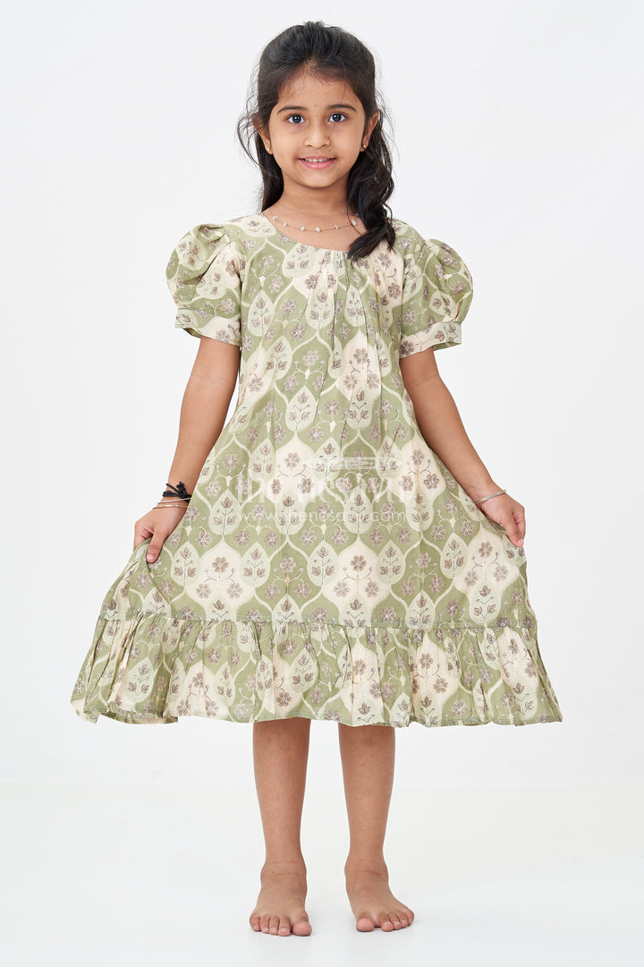 Girls Trending Frock Design in Green Muslin Silk with Floral Leaf Digital Print and Short Puff Sleeves