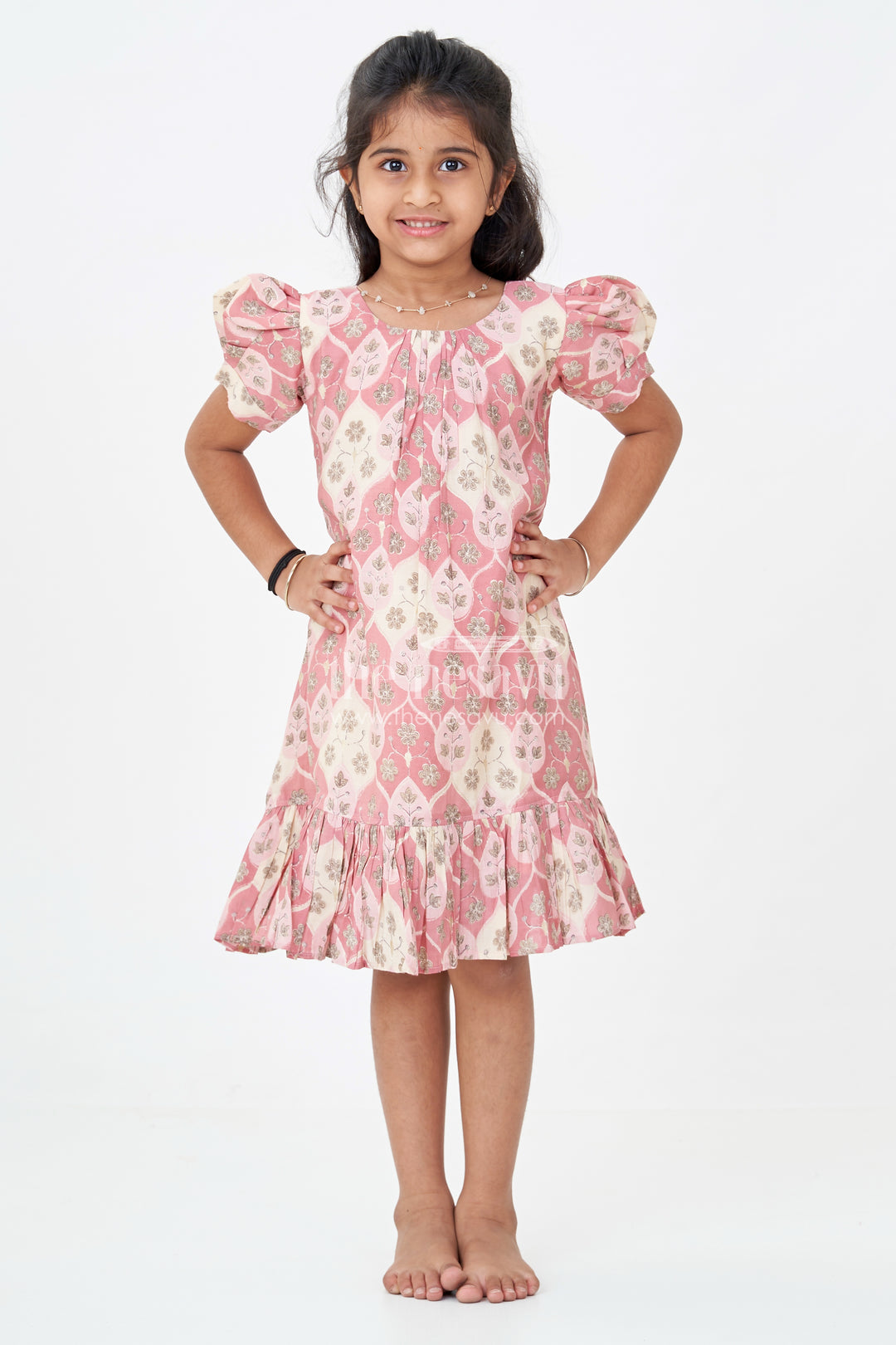 Girls Trendy Frock Designs in Pink Muslin Silk with Leaf Print Motifs and Ruffle Trim for Stylish Days