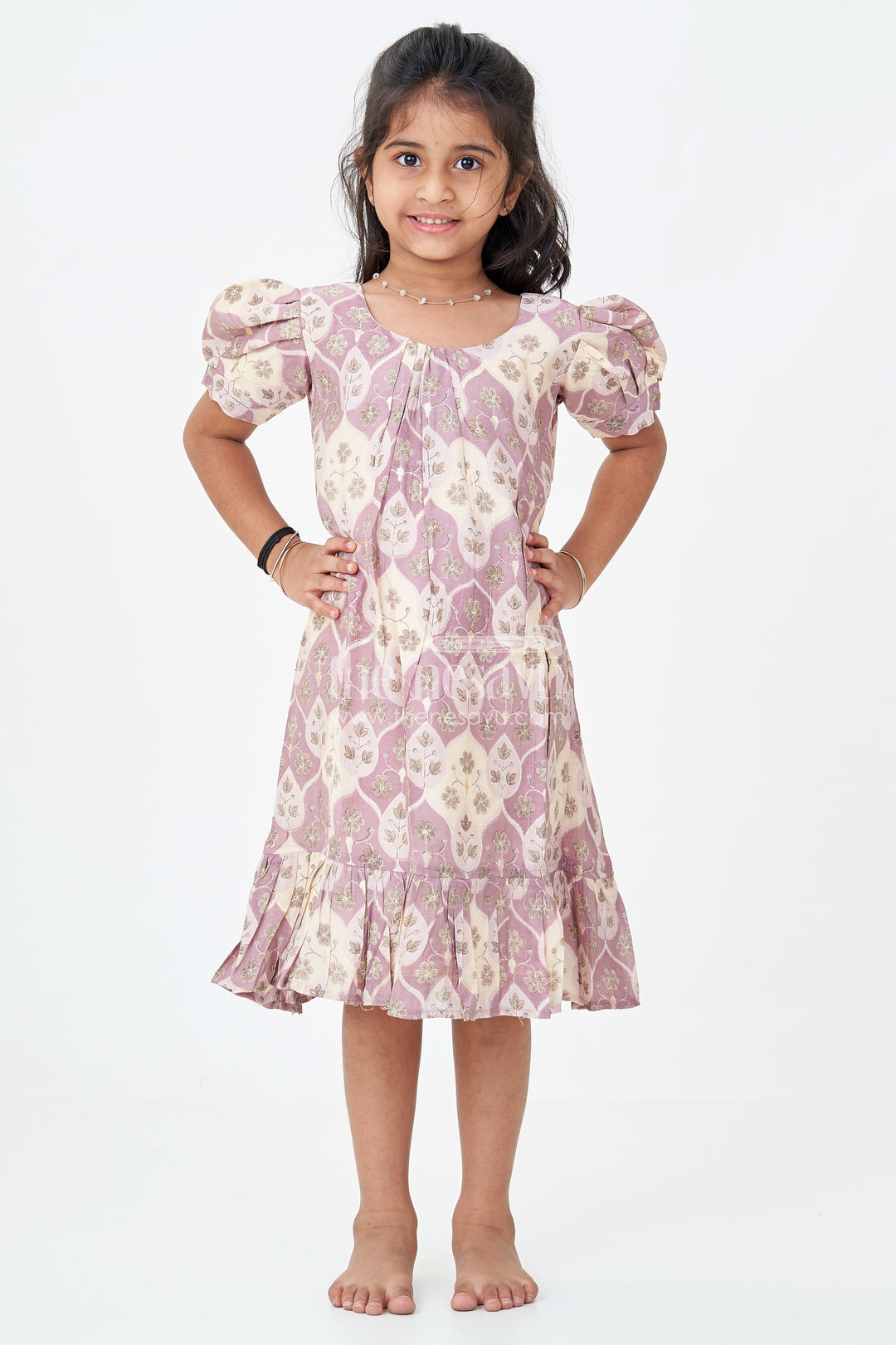 Girls Unique Frock Design in Lavender Muslin Silk with Leaf Print and Puffy Sleeves for Everyday Grace