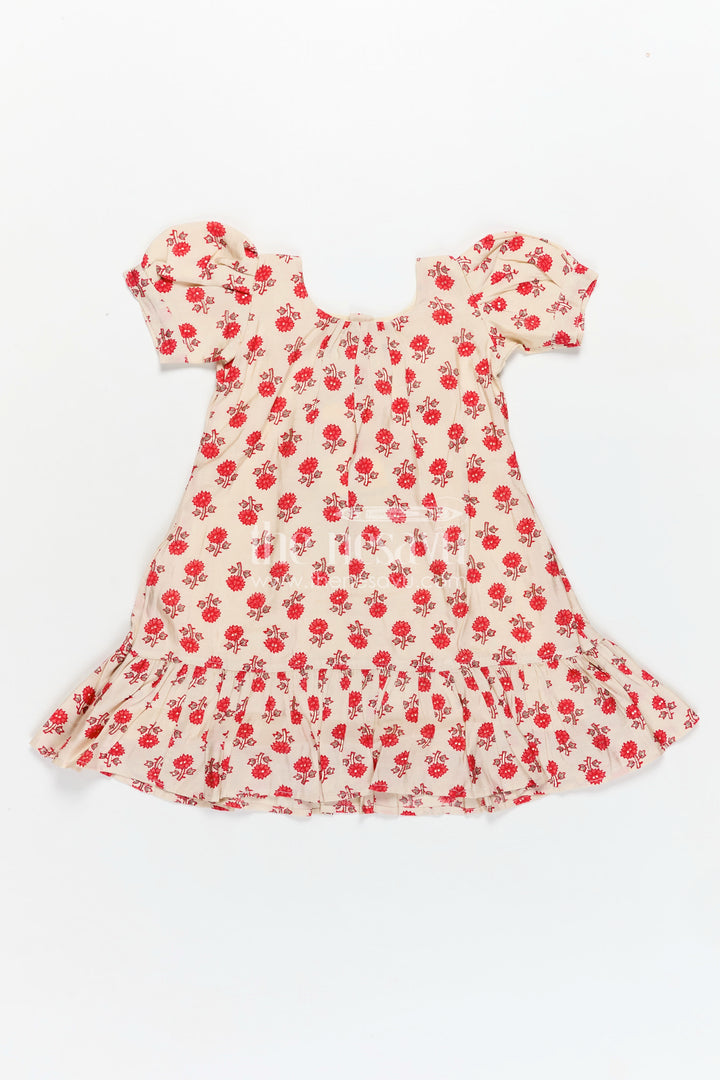 Girls Party Wear Knee Length Frock in Beige Muslin Silk with Red Floral Print and Puff Sleeves
