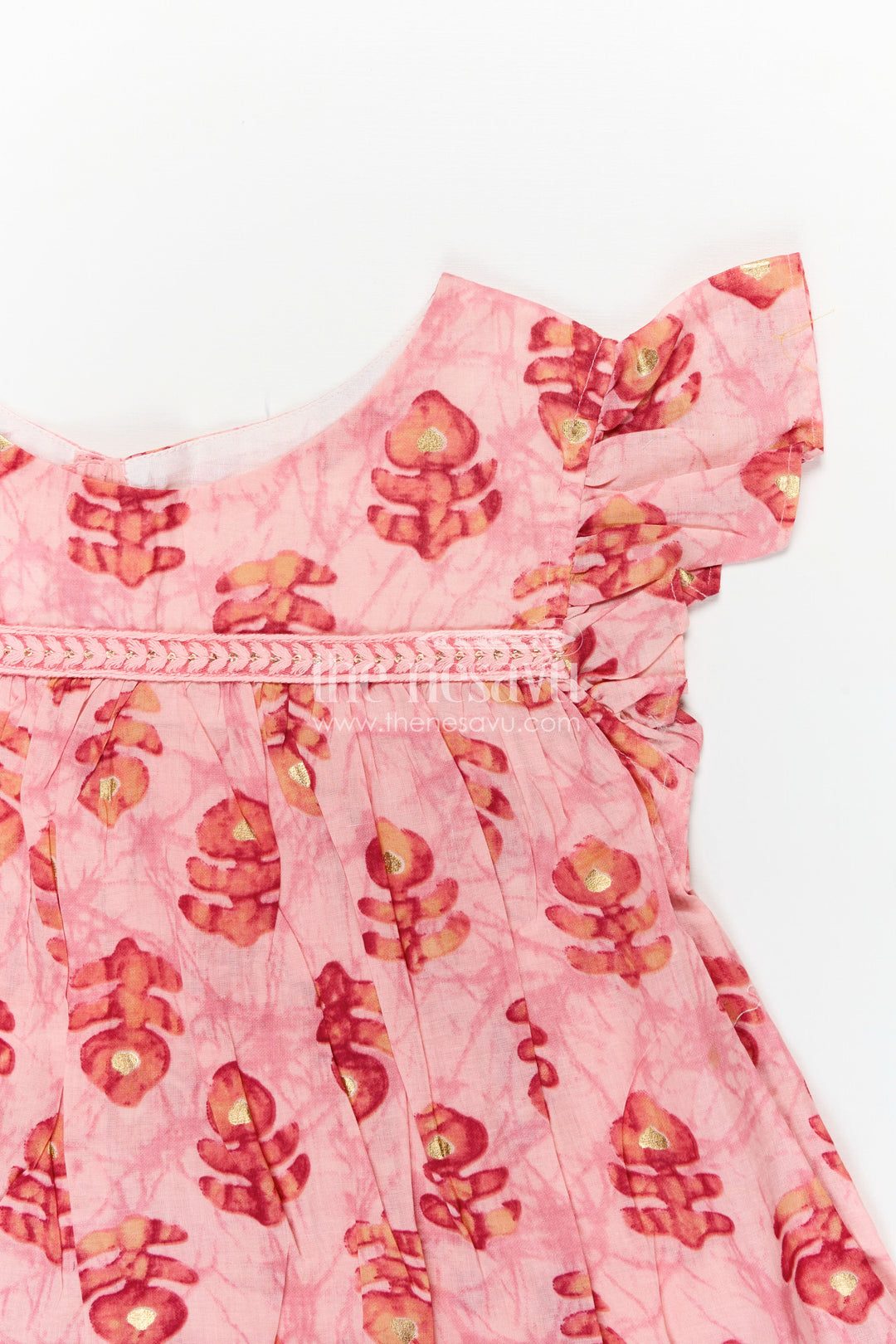 Girls Cotton Frock for Daily Wear in Peach with Golden Floral Hand Block Prints and Flutter Sleeves