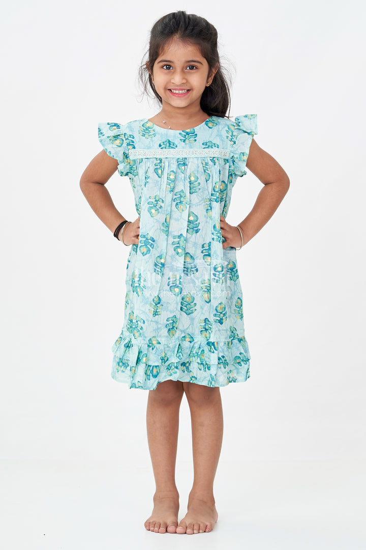 Girls Sky Blue Frock Design in Rayon with Leaf Motifs and Ruffle Accents for Whimsical Wear