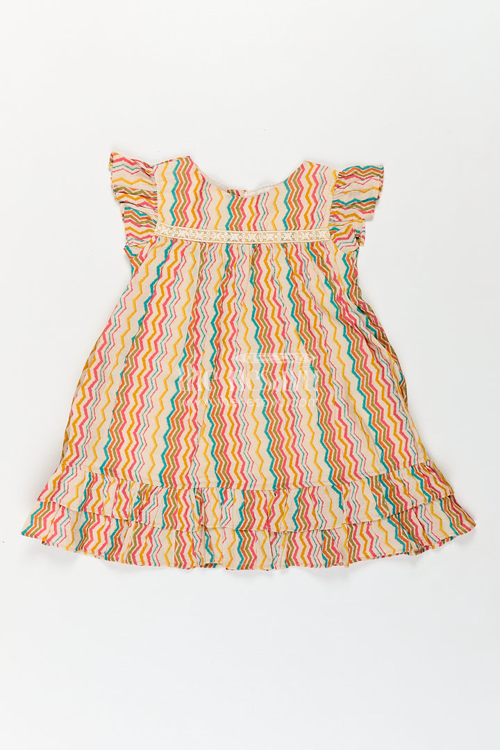 Girls Frock Online Shopping in Cream Modal Silk with Multicolor Zigzag Print and Frill Sleeves