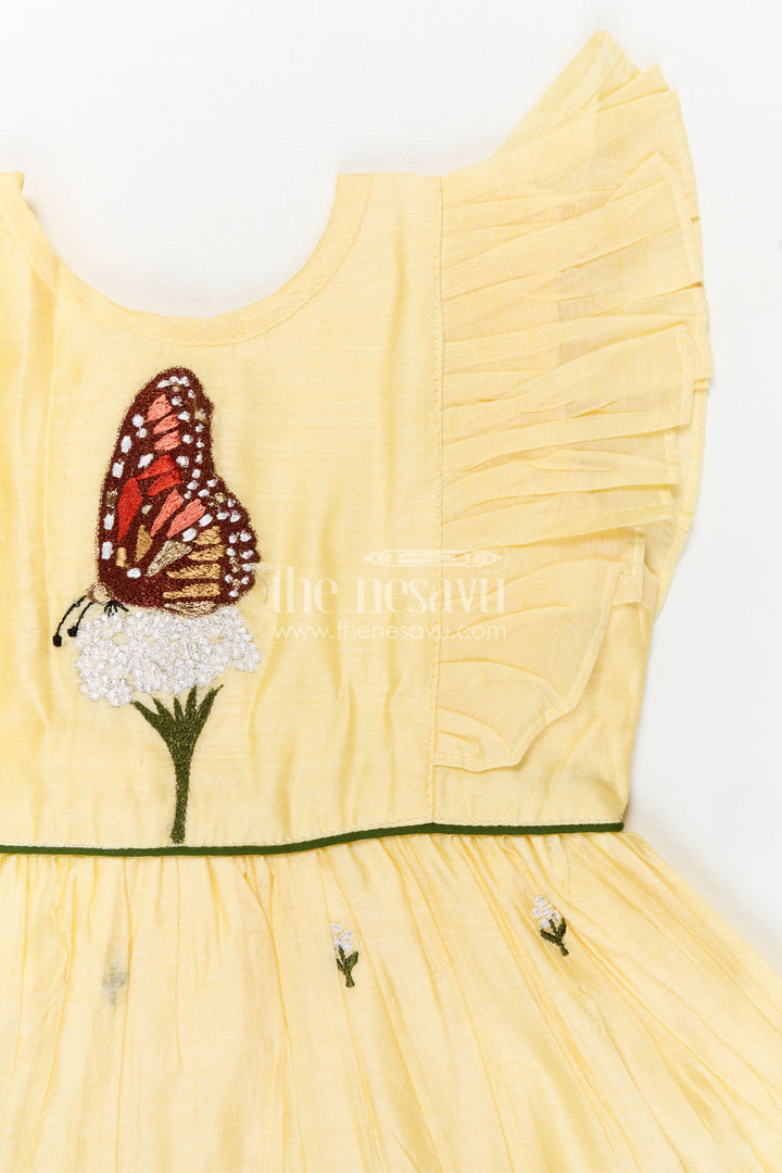 Girls Chanderi Cotton Beautiful Frock Design with Butterfly Embroidery and Ruffle Sleeves in Soft Yellow