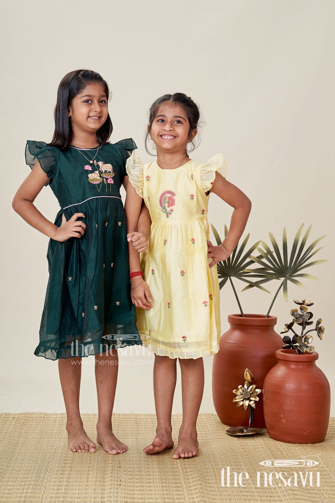 Girls Chanderi Cotton Frock Style with Elephant Lotus Embroidery and Pleated Skirt in Forest Green