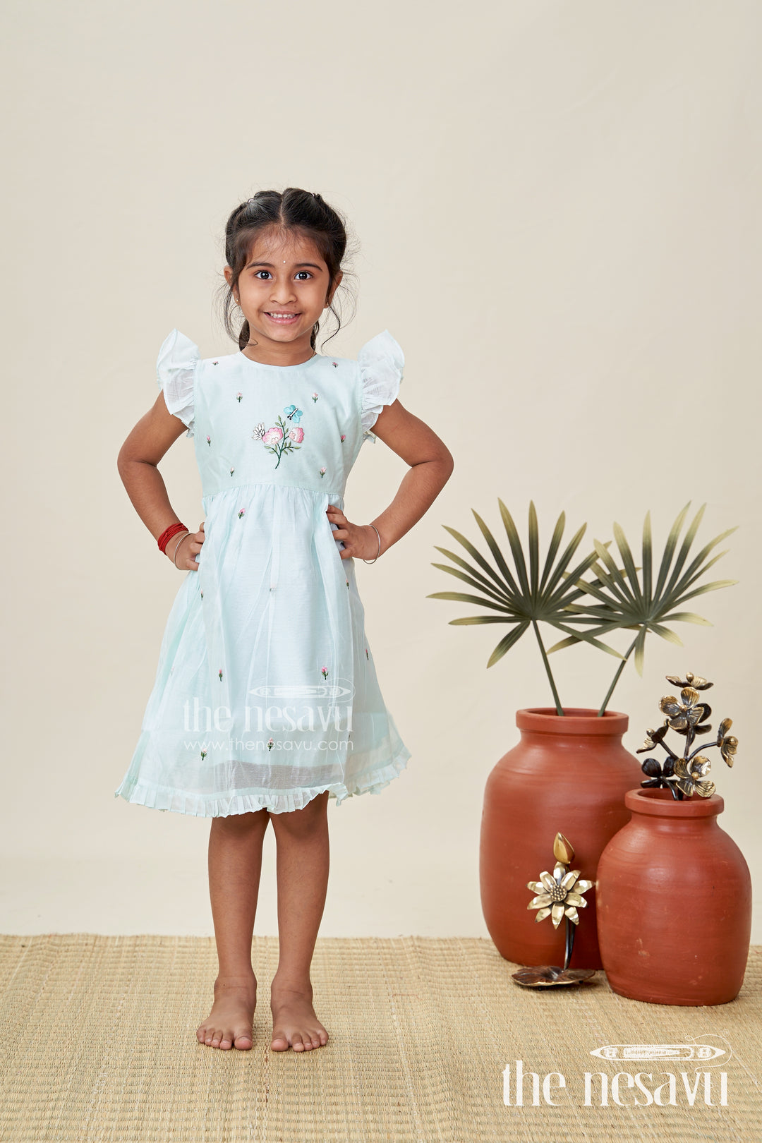 Girls Chanderi Cotton Frock Ki Design in Mint Green with Floral and Butterfly Embroidery for Everyday Elegance