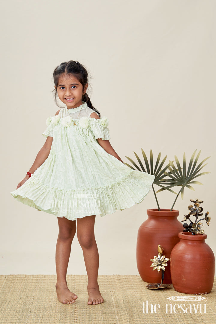 Girls Mini Organza Frock in Light Green with Crushed Texture and Floral Embellishments for Elegant Looks