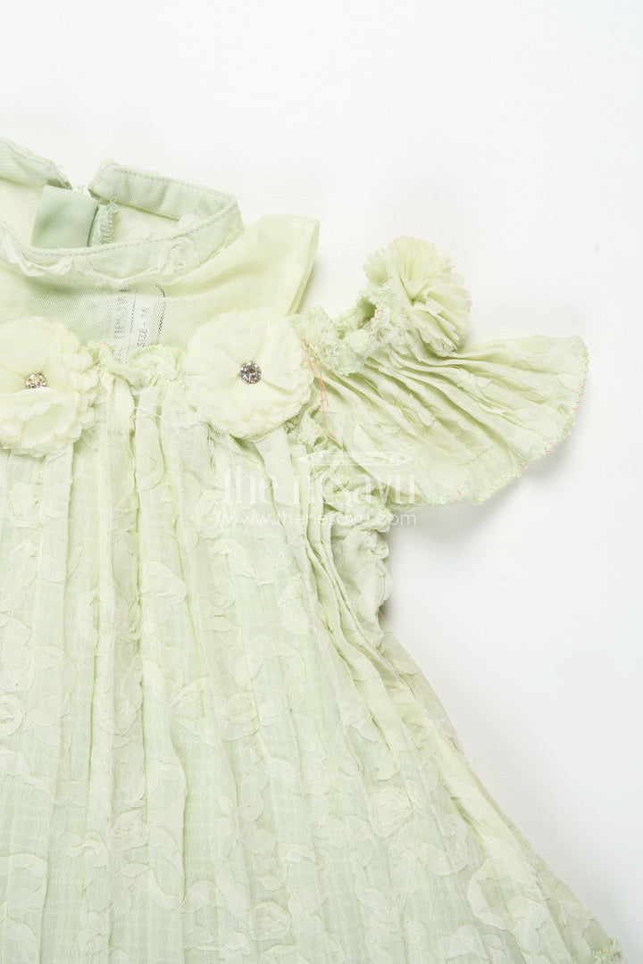 Girls Mini Organza Frock in Light Green with Crushed Texture and Floral Embellishments for Elegant Looks