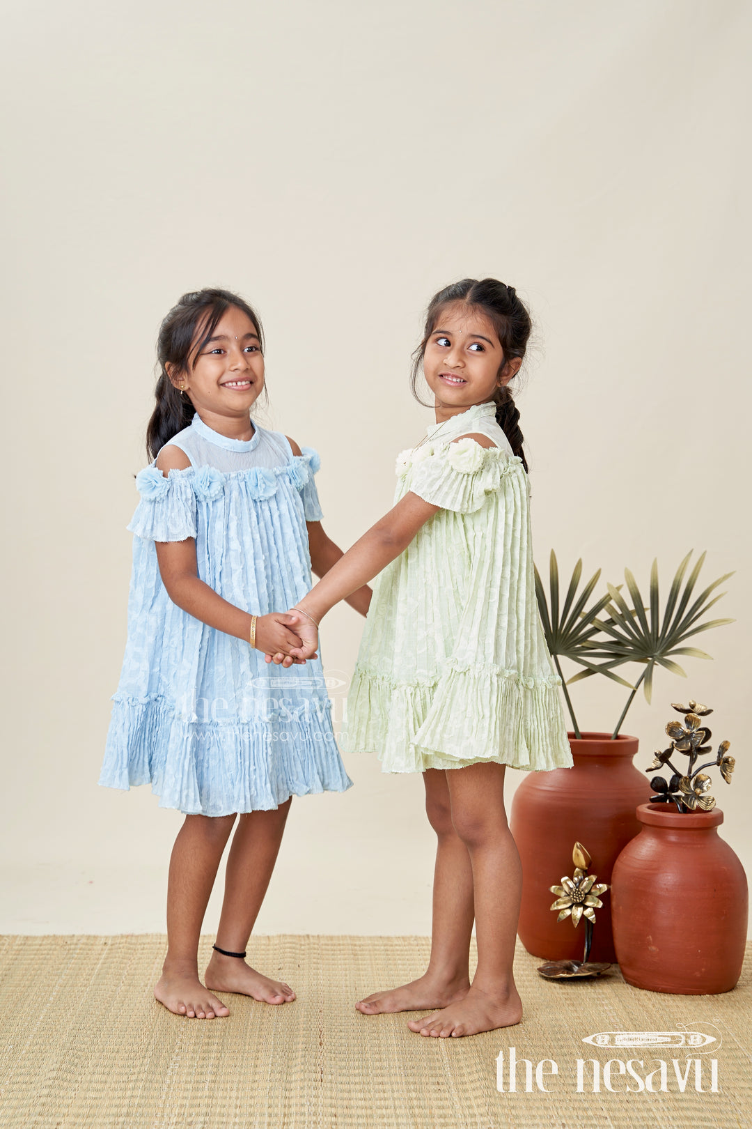 Girls Mini Organza Frock in Light Green with Crushed Texture and Floral Embellishments for Elegant Looks