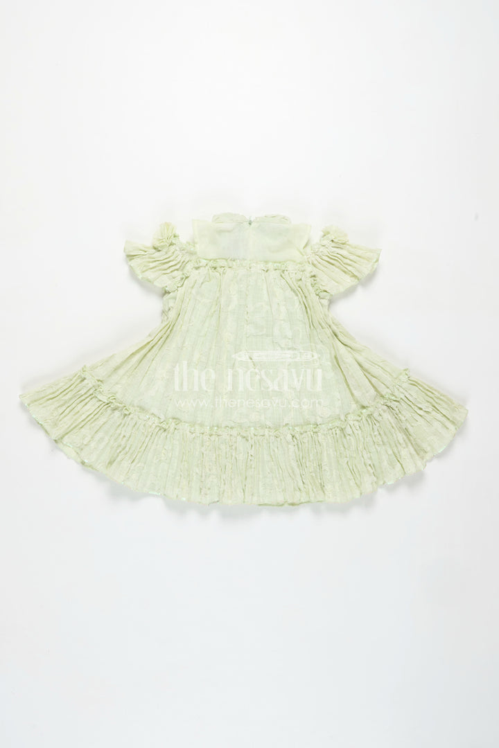Girls Mini Organza Frock in Light Green with Crushed Texture and Floral Embellishments for Elegant Looks