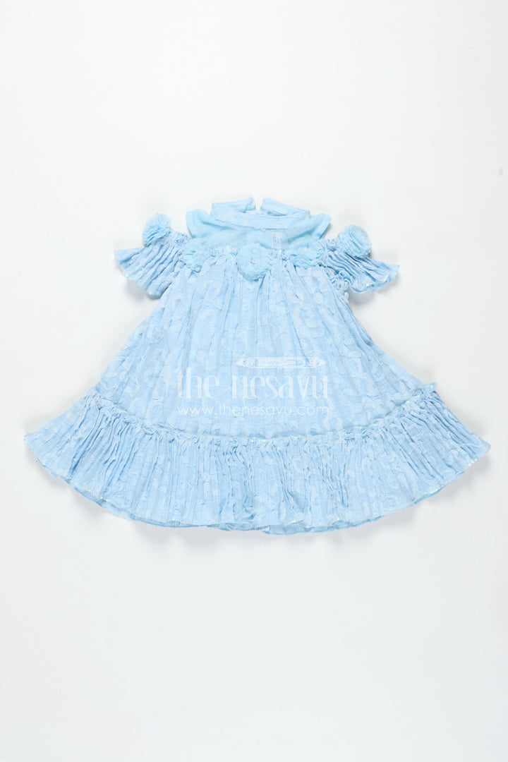 Girls Organza Frock Design 2025 in Sky Blue Crushed Fabric with Puff Sleeves and Delicate Flower Accents