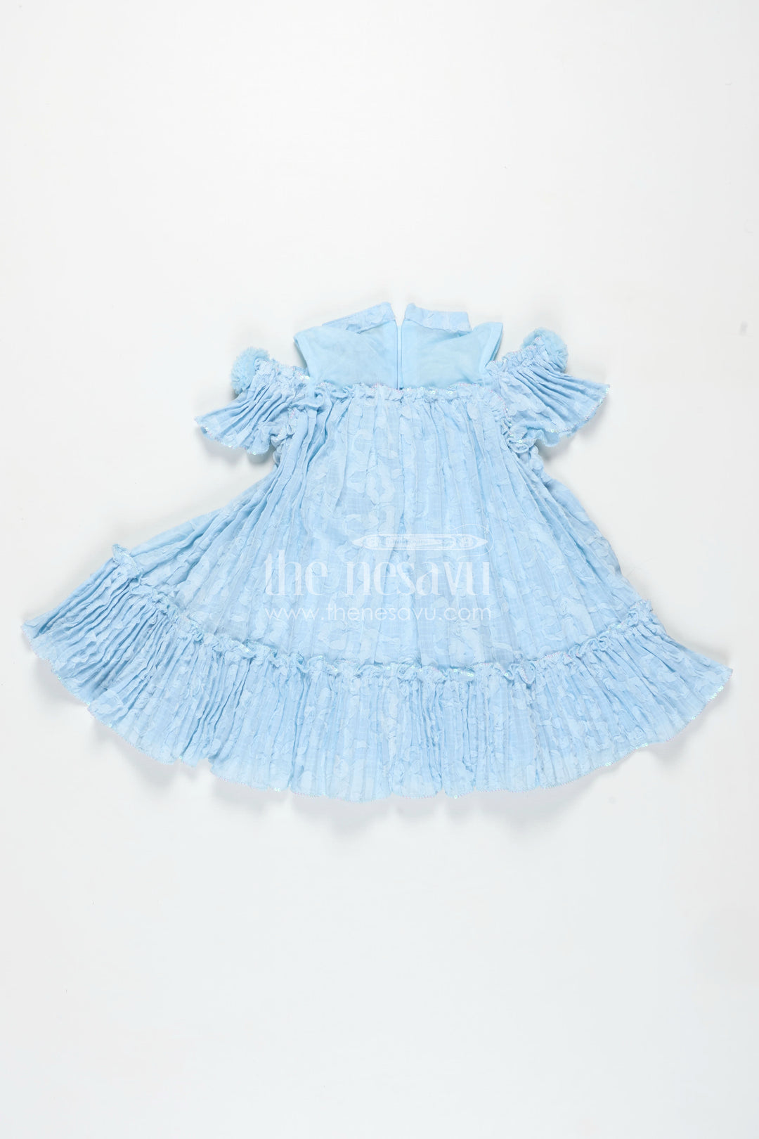 Girls Organza Frock Design 2025 in Sky Blue Crushed Fabric with Puff Sleeves and Delicate Flower Accents