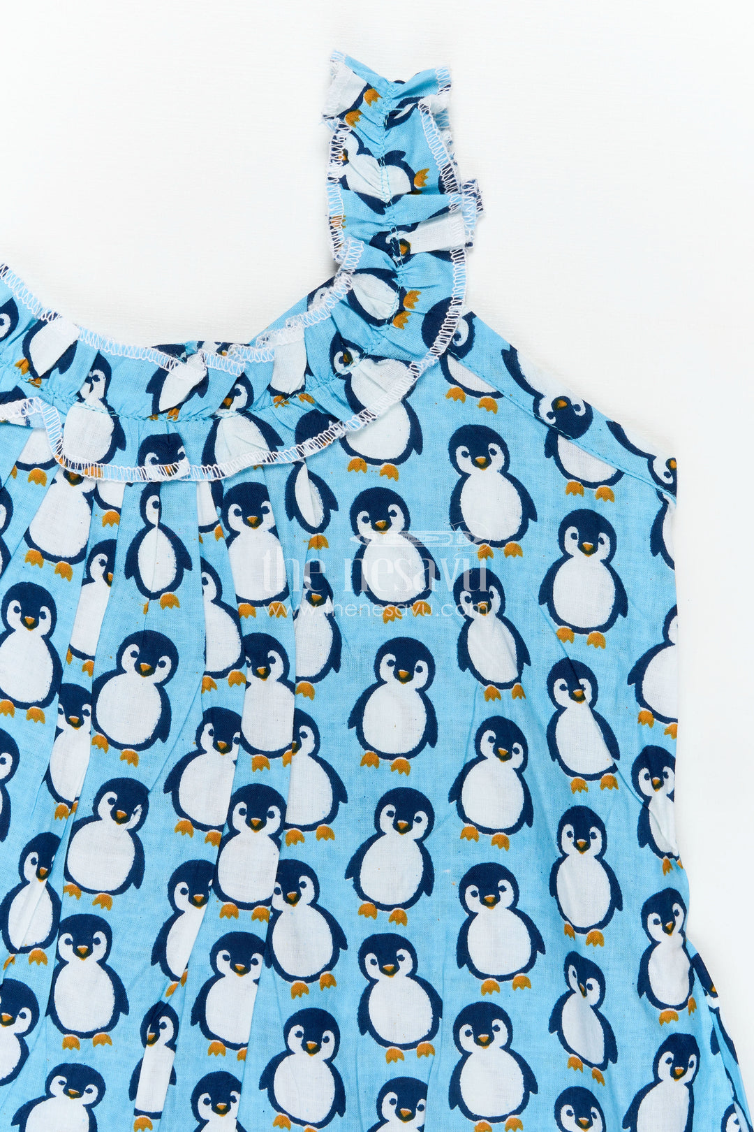 Girls Affordable Cotton Frock with Blue Penguin Hand Block Print and Frill Accents for Comfortable Wear