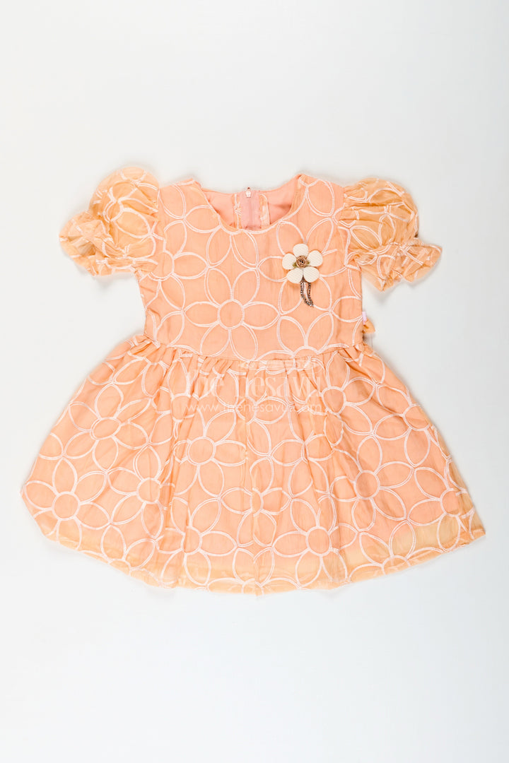 Girls peach embroidered organza frock with puff sleeves for birthday wear
