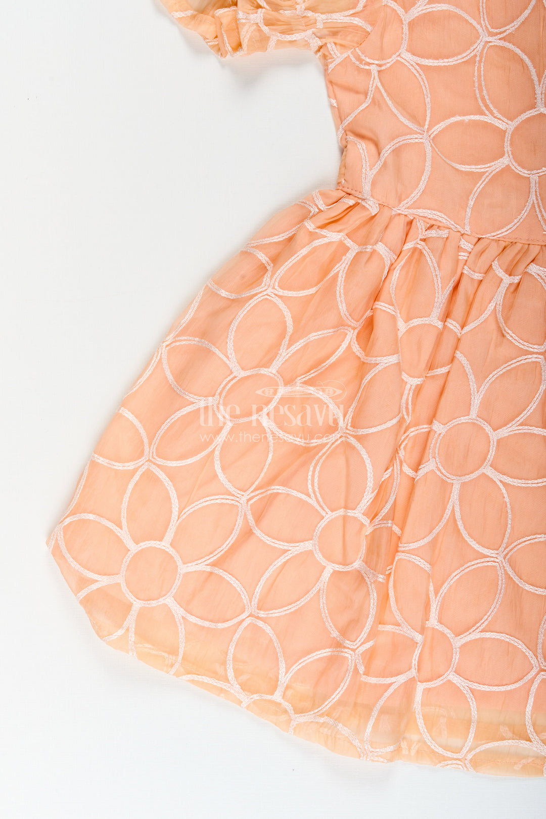 Girls peach embroidered organza frock with puff sleeves for birthday wear