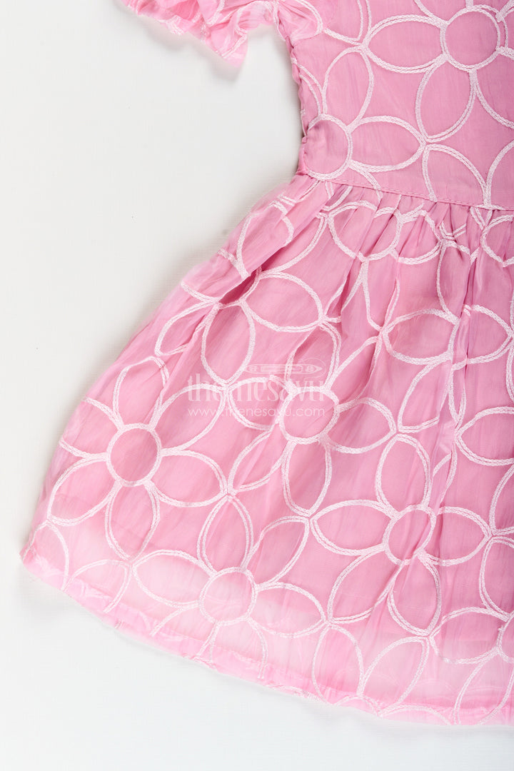 Girls pink embroidered organza frock with floral brooch for festive wear