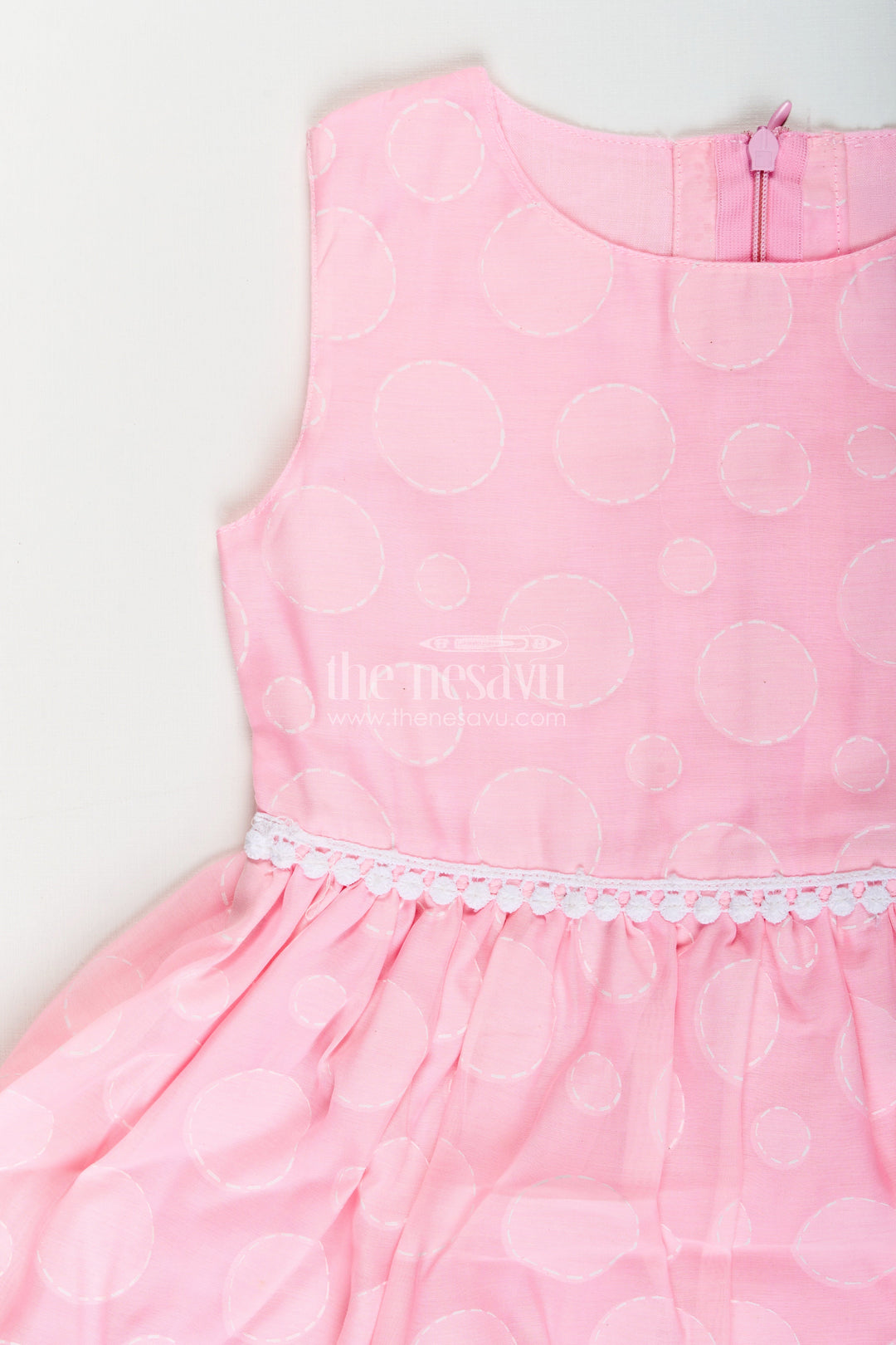 Girls pink georgette frock with polka dots for birthday celebrations