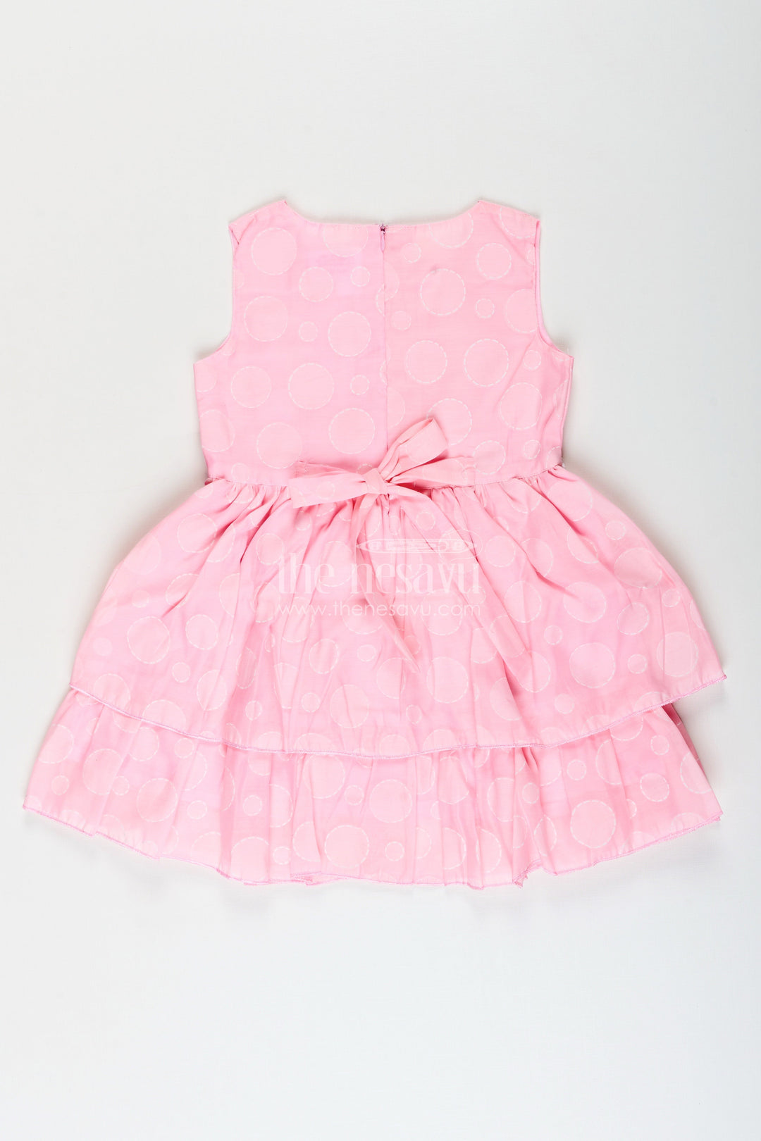 Girls pink georgette frock with polka dots for birthday celebrations