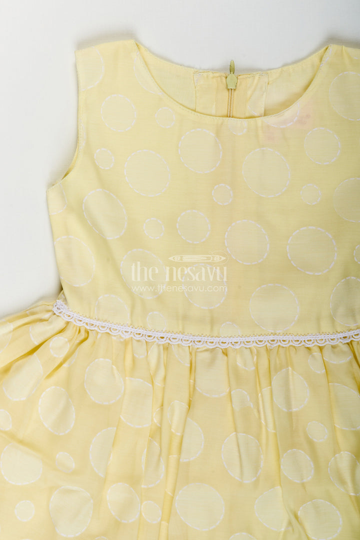 Girls yellow georgette frock with polka dots for parties and festive wear