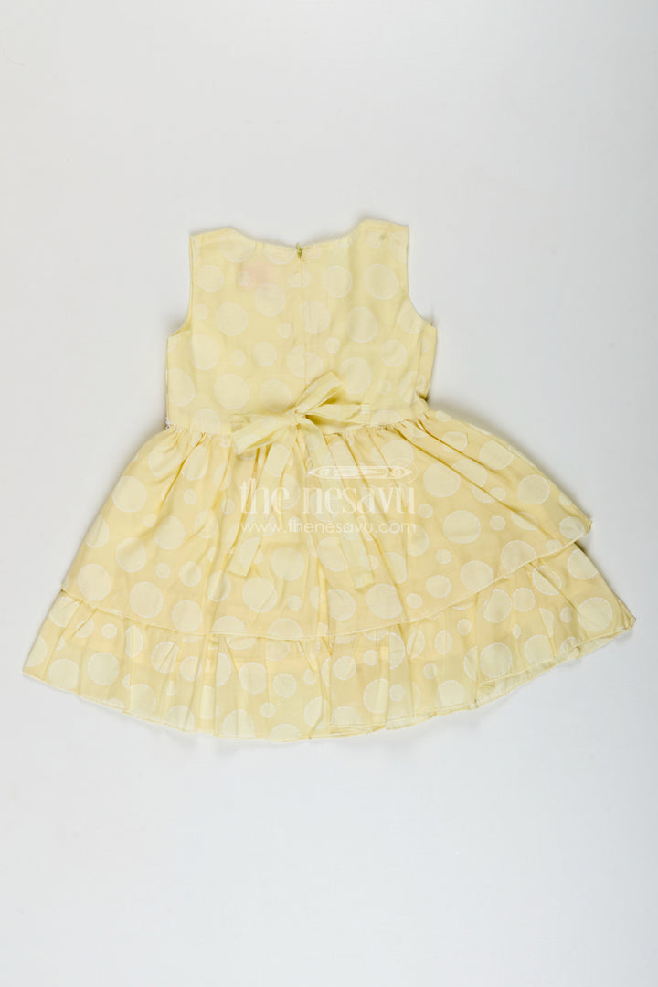 Girls yellow georgette frock with polka dots for parties and festive wear