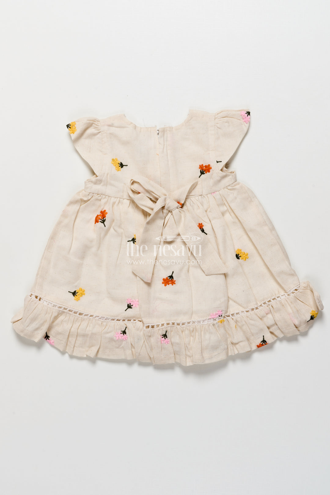 Cotton frock for toddler girls with floral embroidery and frill hem
