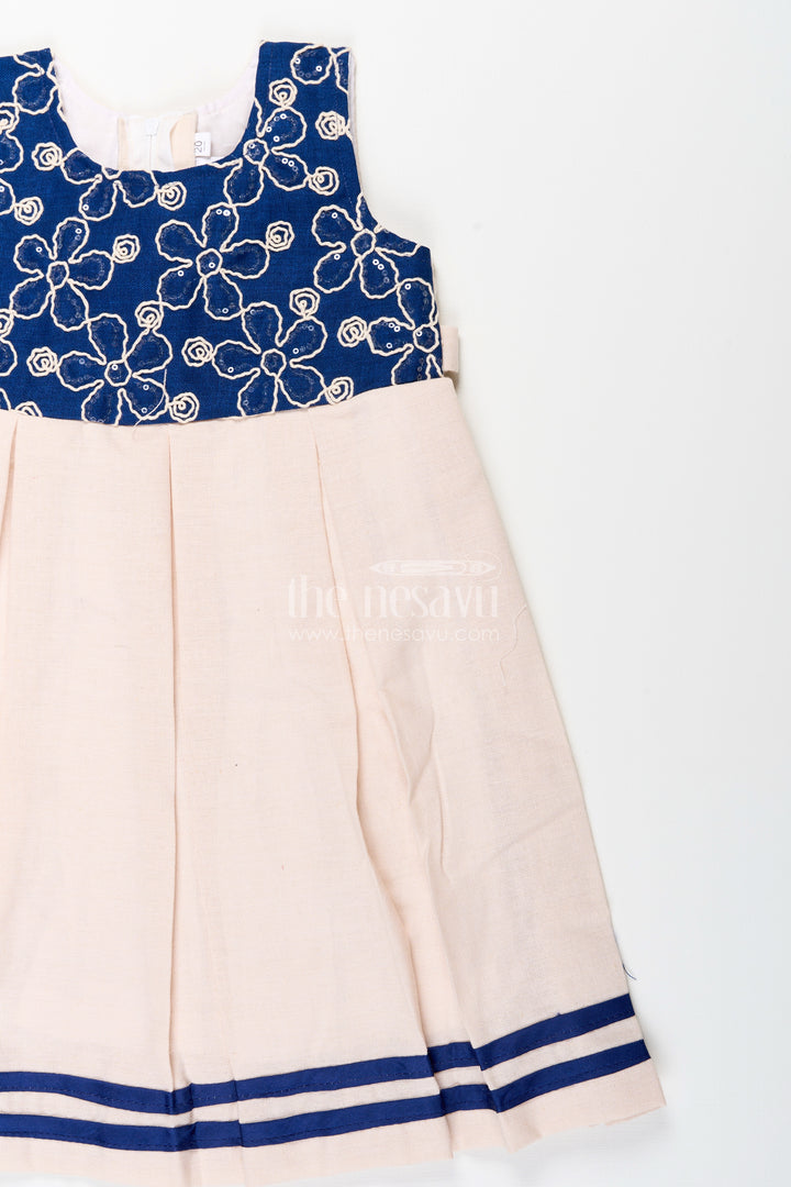 Baby girl flax cotton frock with navy yoke embroidery for festive occasions