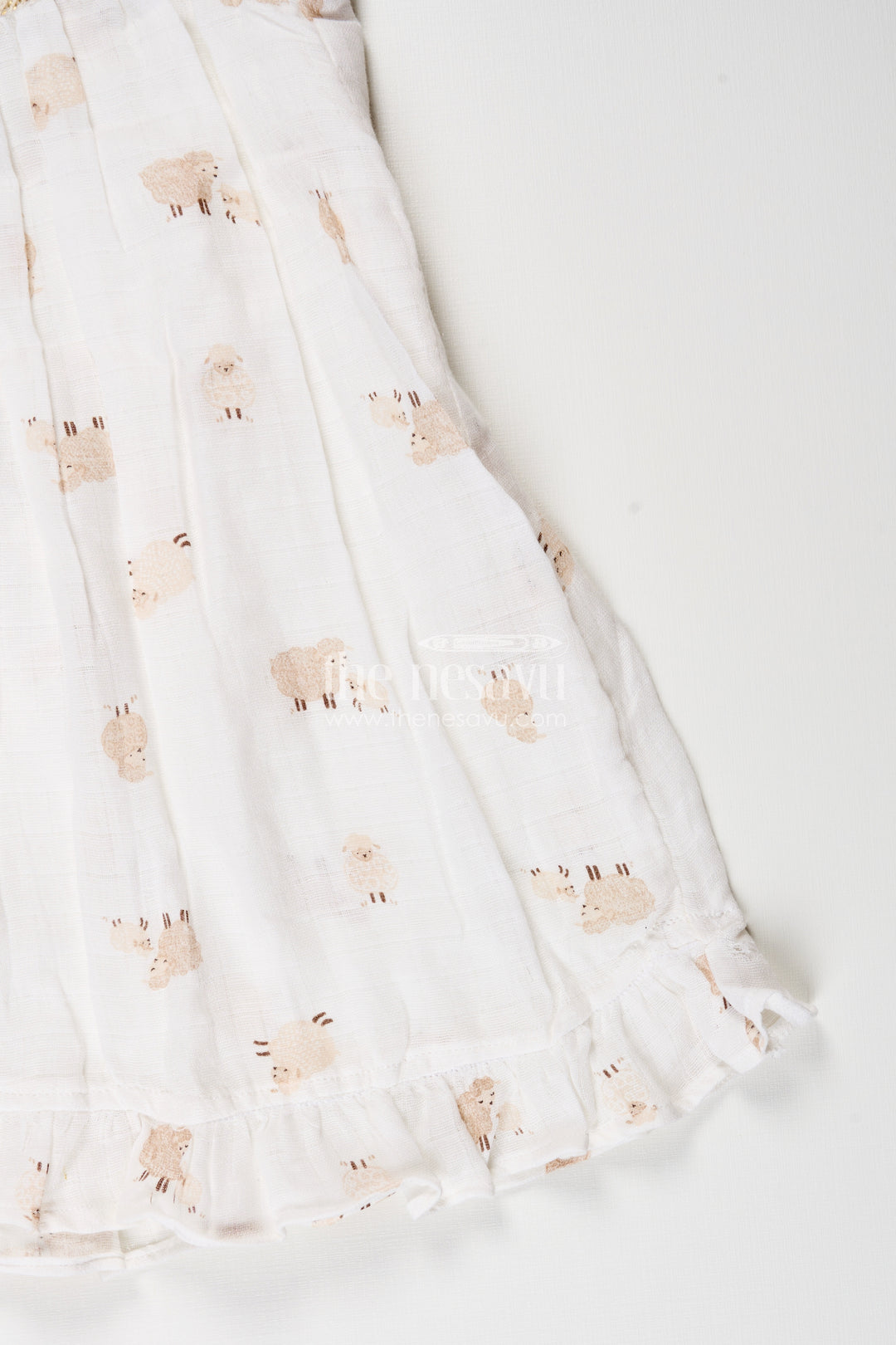 White muslin cotton frock for baby girls with soft sheep print