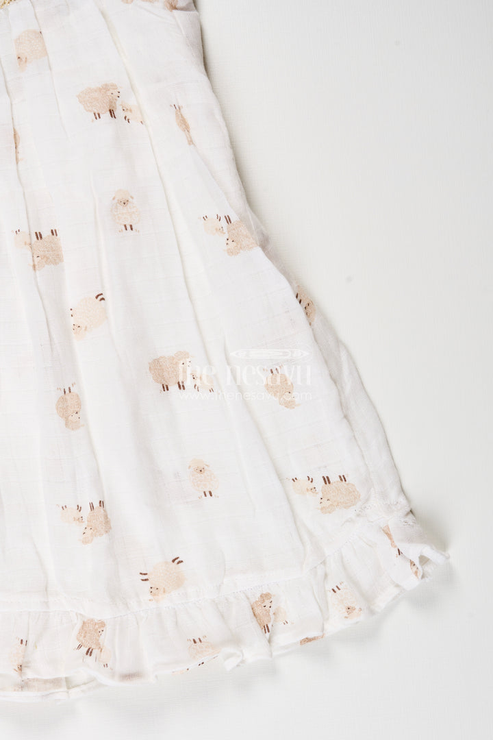 White muslin cotton frock for baby girls with soft sheep print